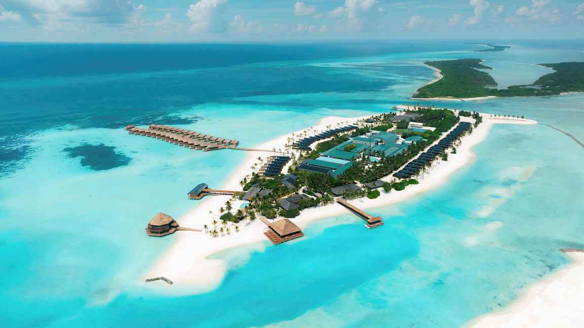 Luftfotografi över en tropisk ö med hotellbyggnader omgivna av turkost vatten och vita sandstränder. (AI-genererad text)