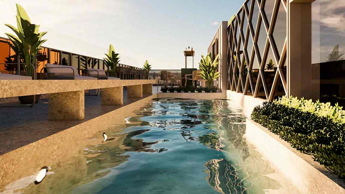 En modern terrass med en lång pool omgiven av liggstolar och växter. (AI-genererad text)