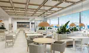 En restaurang med modern inredning och stora fönster som vetter mot havet. (AI-genererad text)