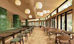 Ett ljust inrett kafé eller restaurang med trädetaljer, gröna kakelväggar, bord och stolar samt stora fönster som släpper in dagsljus. (AI-genererad text)