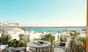 Utsikt från en balkong med havet i bakgrunden. (AI-genererad text)