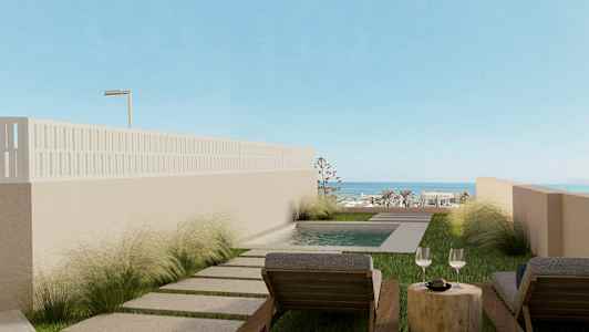 Två solstolar vid en liten pool med utsikt över havet. (AI-genererad text)