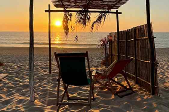 Stranden vid Noah Beach House