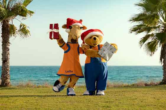 Lollo & Bernie med julklapparog nissehuer