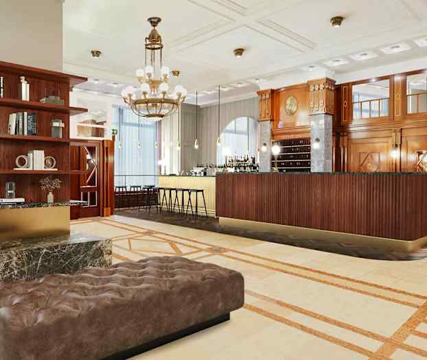 Reception med en elegant inredning, inklusive en bänk i läder och hyllor med böcker. (AI-genererad text)