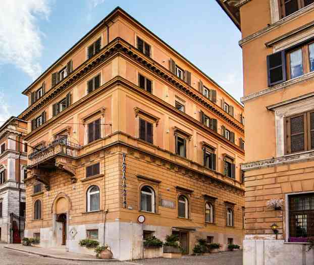 Ett flerbostadshus i stadsbebyggelse. (AI-genererad text)