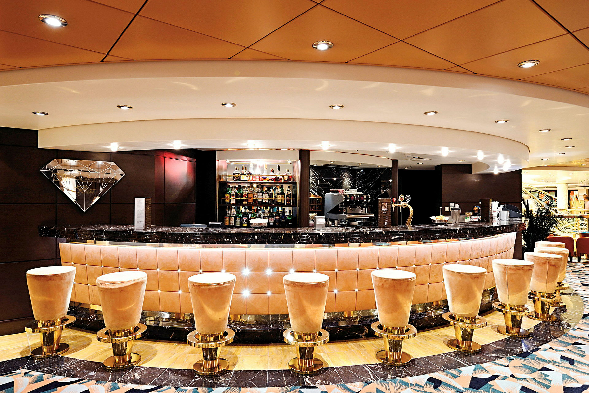 En elegant bar med högstolar framför. (AI-genererad text)
