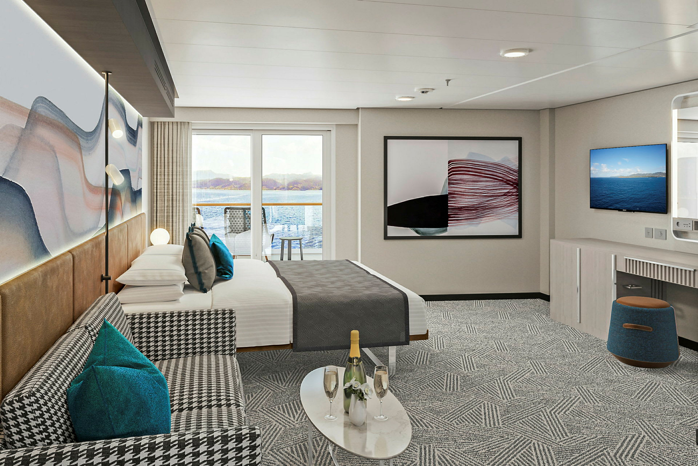 Ett hotellrum med en säng, soffa och utsikt mot vattnet. (AI-genererad text)