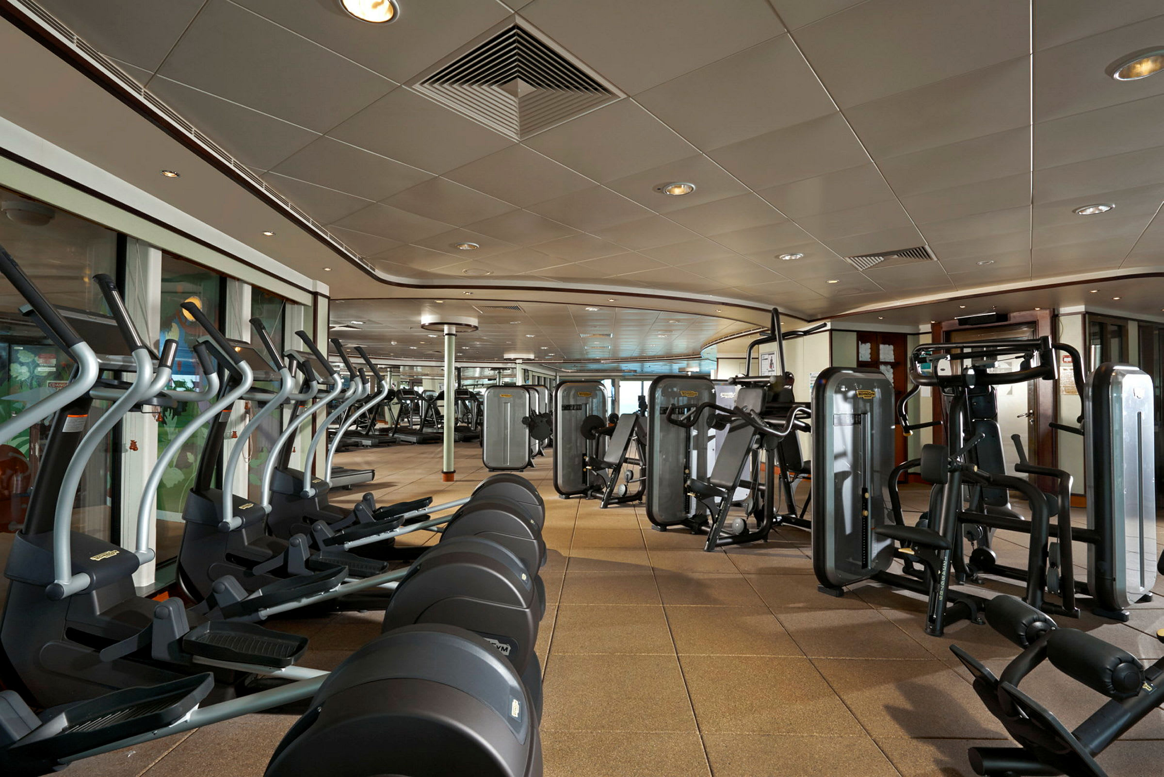 Gym med träningsmaskiner och vikter. (AI-genererad text)