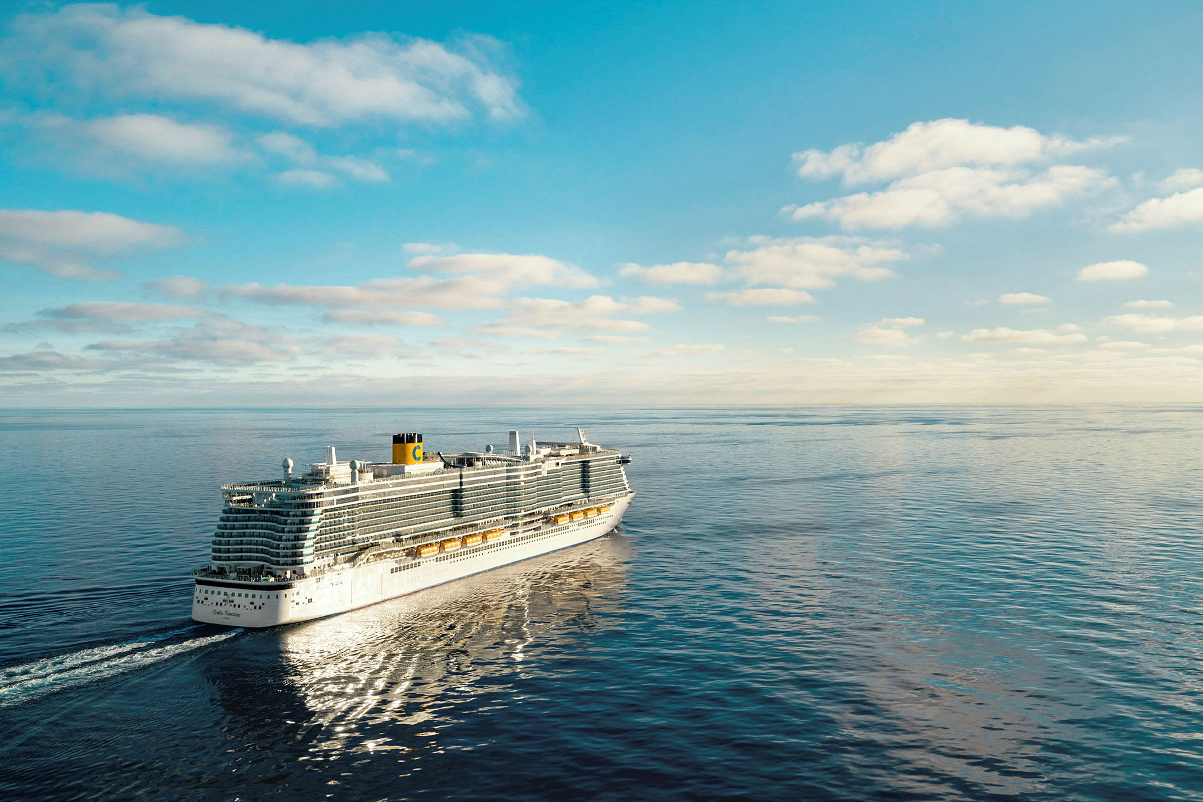 Ett kryssningsfartyg glider fram över havet under en klar himmel. (AI-genererad text)