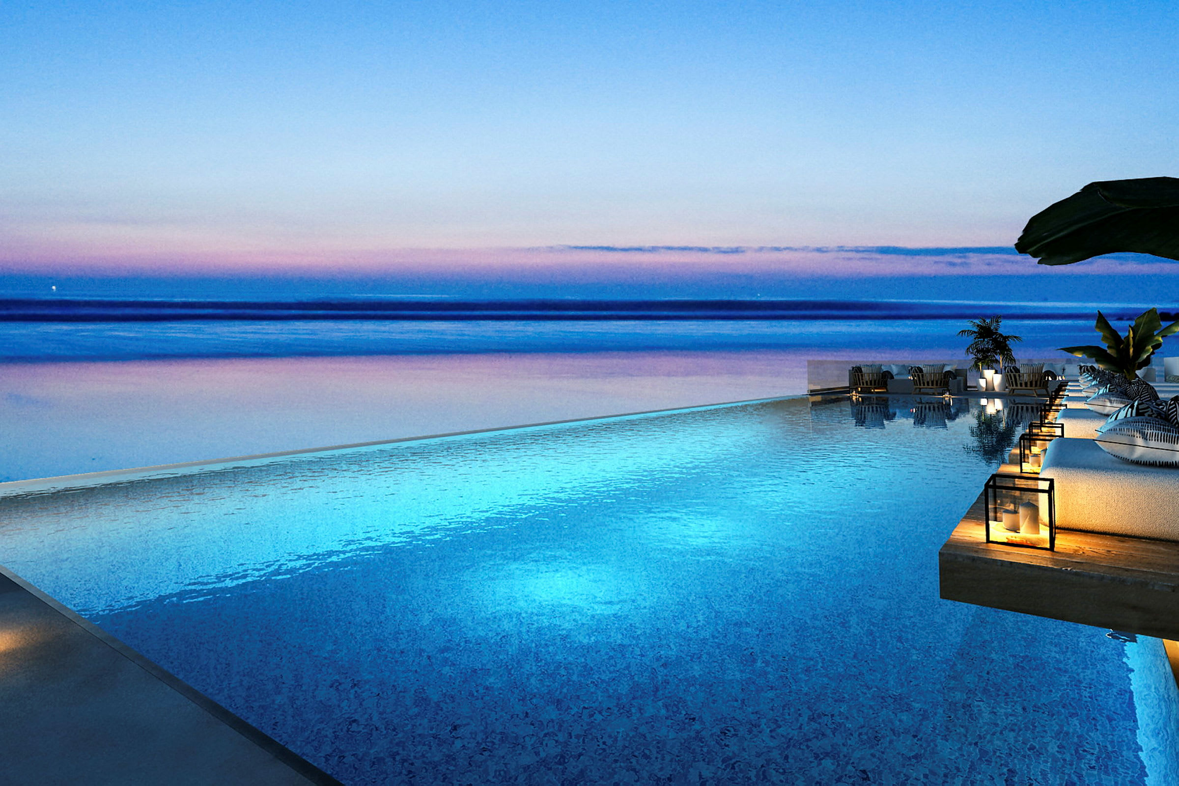 En infinitypool med utsikt över havet under en färgskiftande skymning. (AI-genererad text)