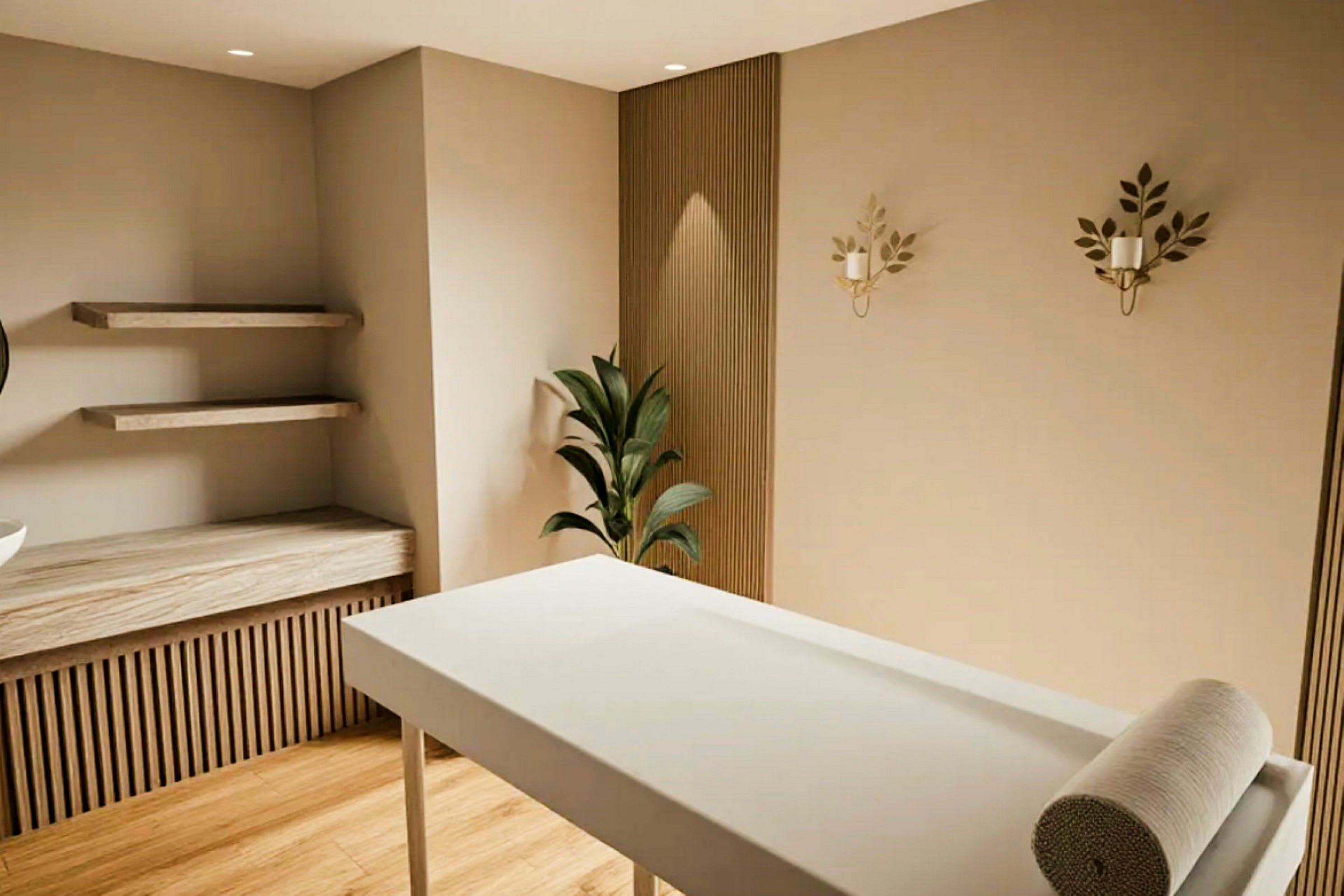 Ett rum med en massagebänk, hyllor på väggen, en grön växt och dekorativa element på väggen. (AI-genererad text)