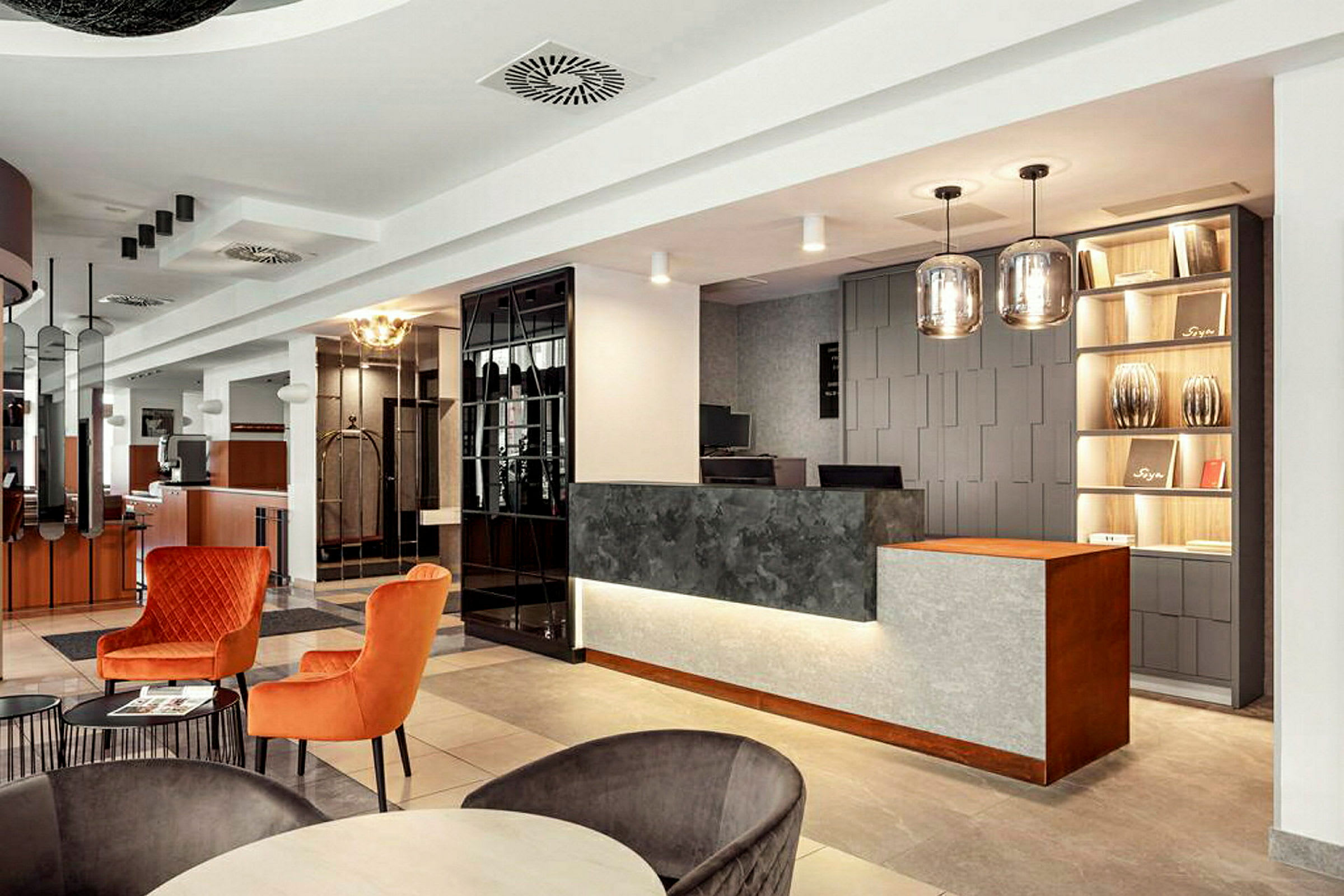 Receptionen på ett hotell med en modern och elegant inredning. (AI-genererad text)
