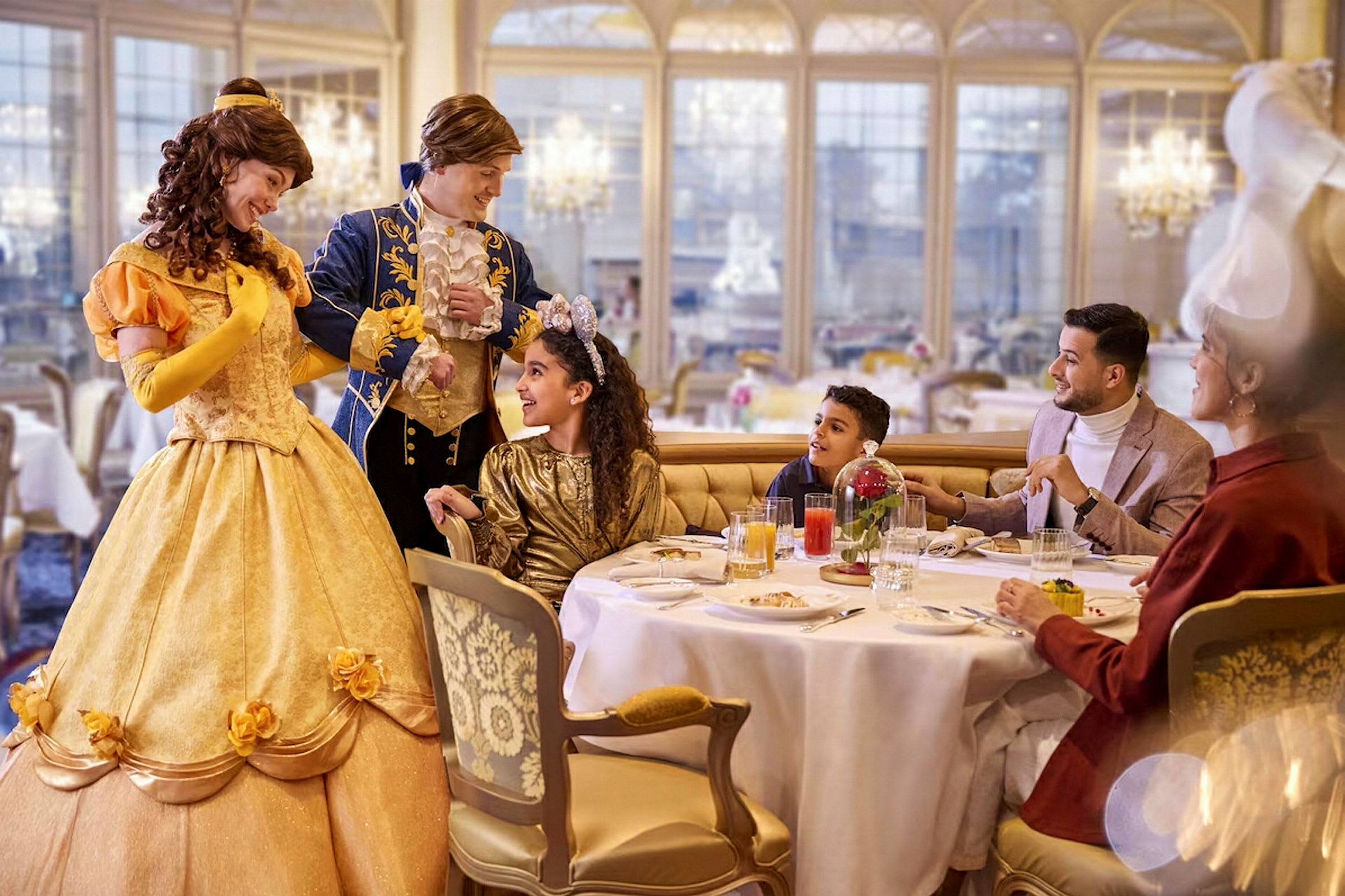 Personer klädda som prinsen och prinsessan i en elegant restaurang. (AI-genererad text)
