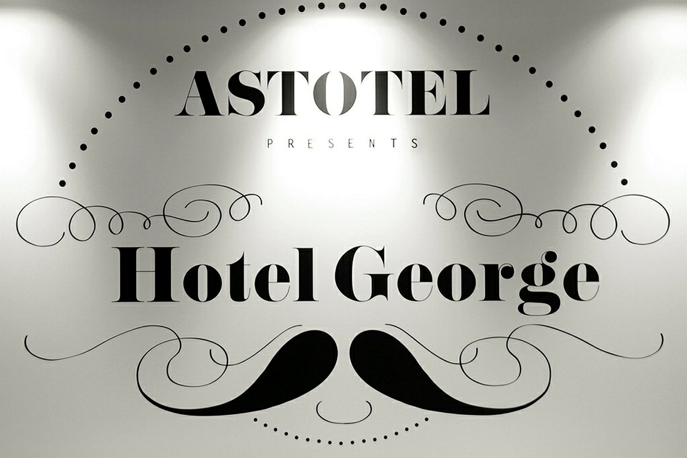 Logotyp för Hotel George med typografi och dekoration. (AI-genererad text)