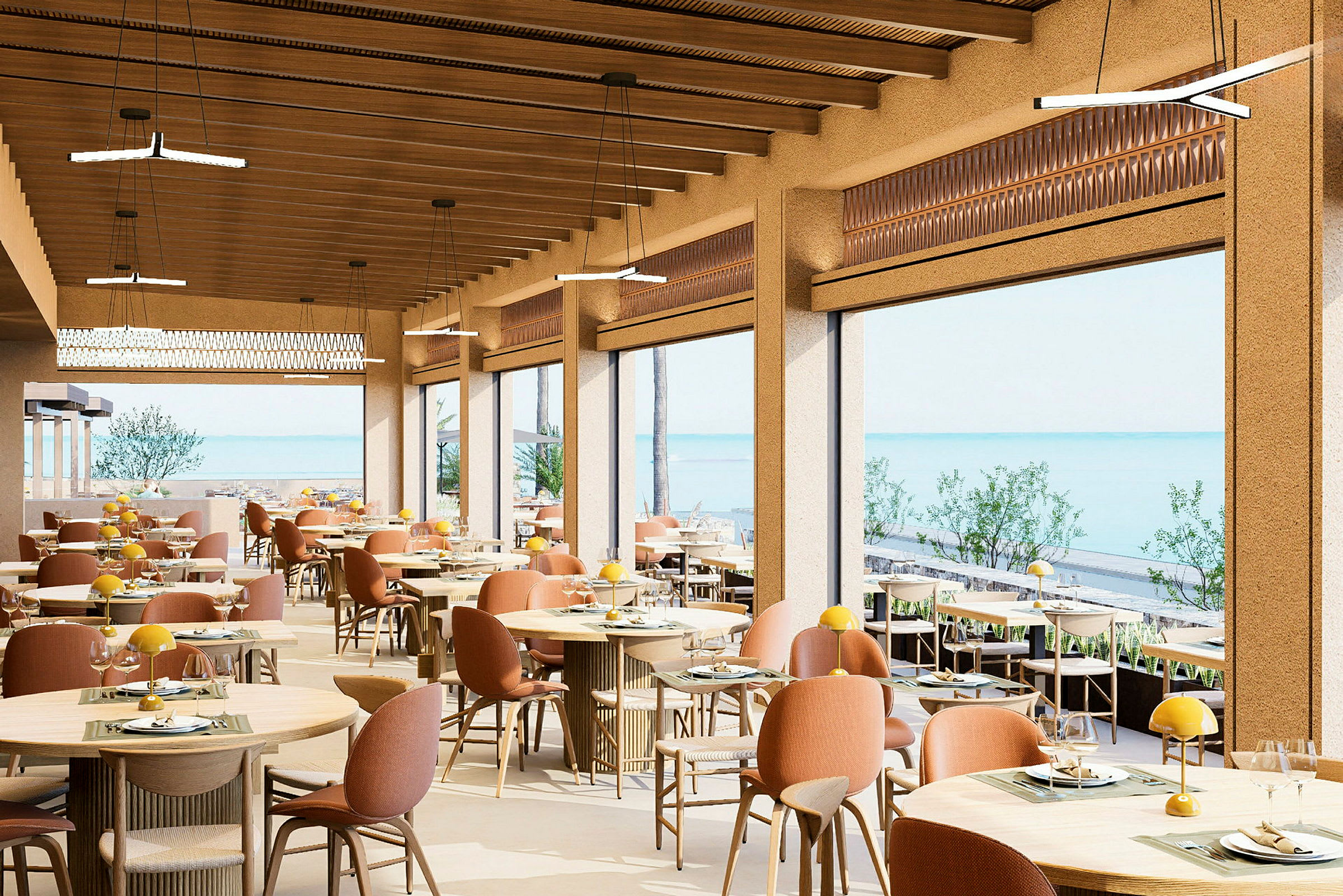 En restaurang med stora fönster och utsikt över havet. Inredningen har trädetaljer och bekväma stolar. (AI-genererad text)