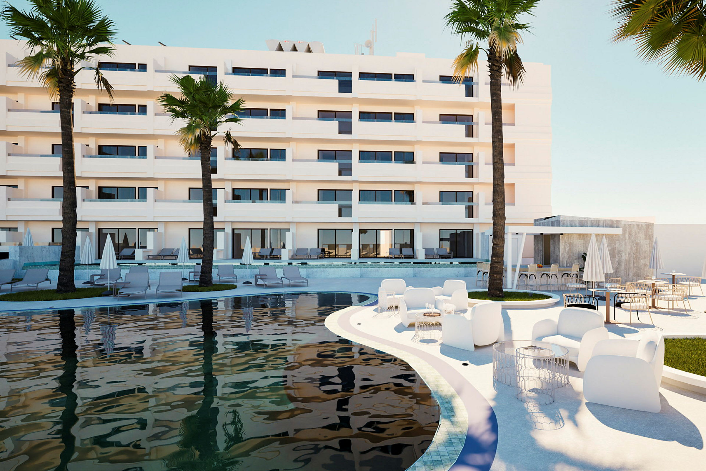 Bilden visar en modern byggnad med flera våningar som innefattar balkonger och stora fönster. Framför byggnaden finns en pool med solstolar och parasoller. En loungeområde med vita möbler står nära poolen. (AI-genererad text)