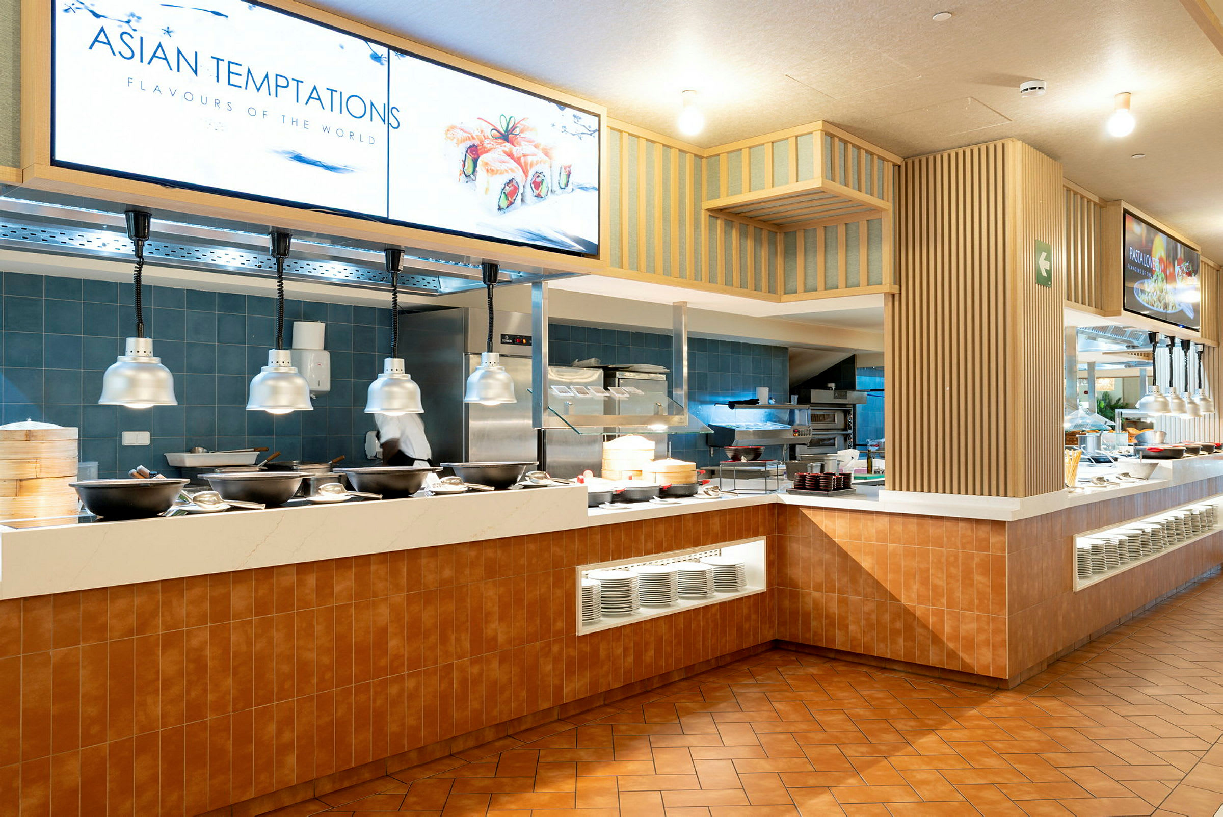 Bufféområde i en restaurang med asiatisk inriktning. (AI-genererad text)