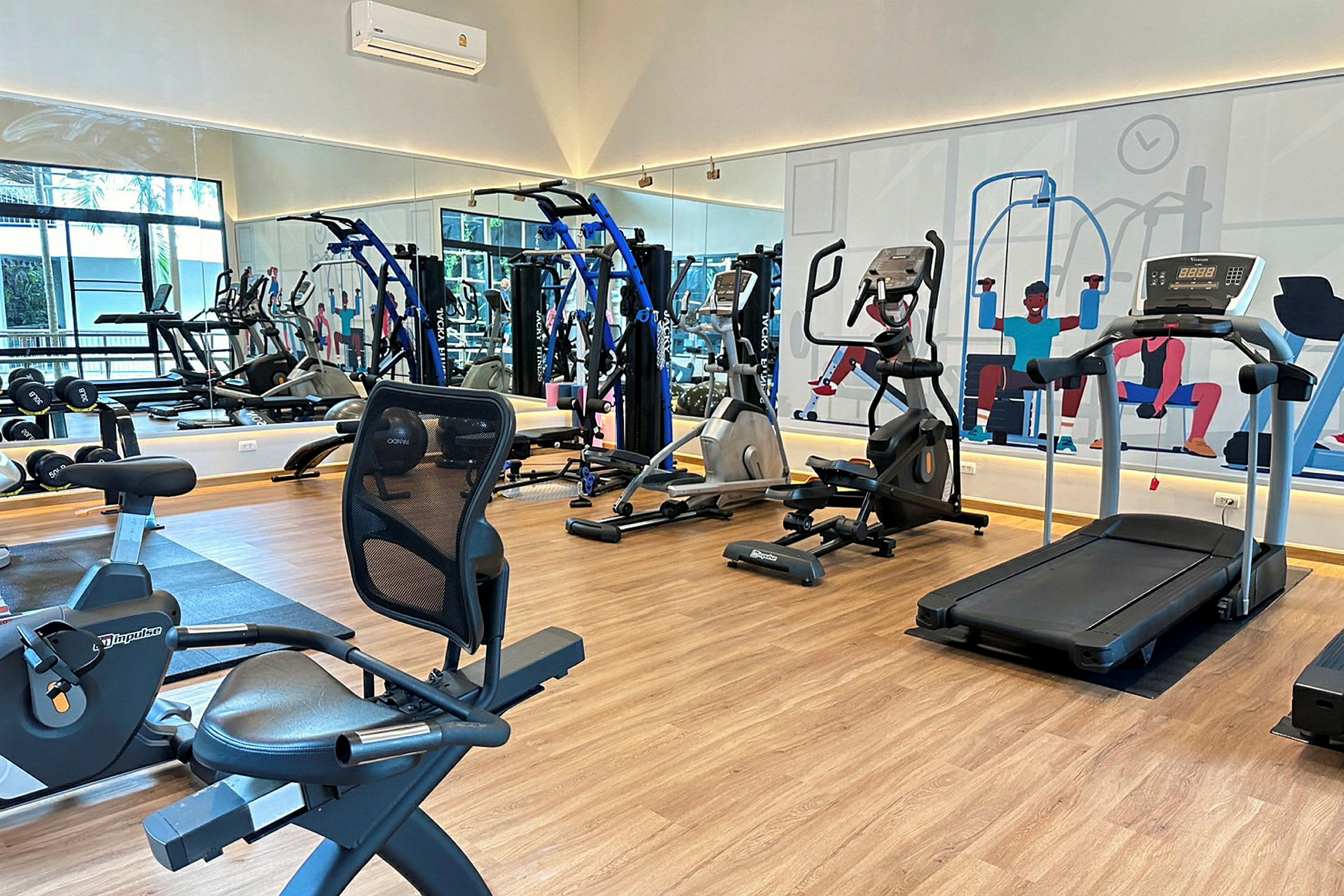 Gymutrustning och träningsmaskiner på ett gym. (AI-genererad text)